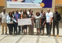 Access Bank, ITC present GHS100k to UGMC for clinical trials center project