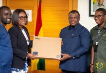 Sam George presents laptops to Parliament to support digital operations