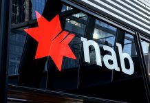 NAB reports higher third-quarter cash earnings as customer pressures persist