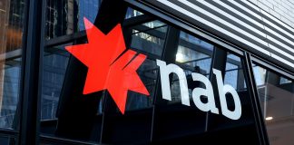 NAB reports higher third-quarter cash earnings as customer pressures persist