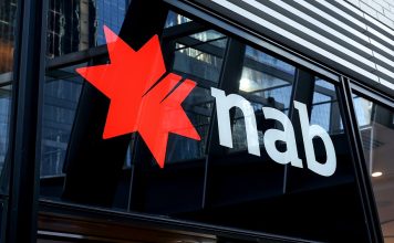 NAB reports higher third-quarter cash earnings as customer pressures persist