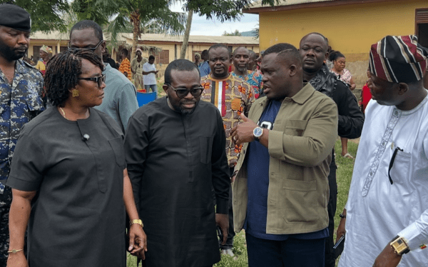 Sam George in a chat with NCA Director-General, Rev. Ing. Edmund Fianko, as Eastern Regional Minister (left) and Executive Secretary of GIFEC (right) looks on
